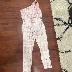 2 piece fabletics set. One shoulder sports bra with leggings (midriff shows)